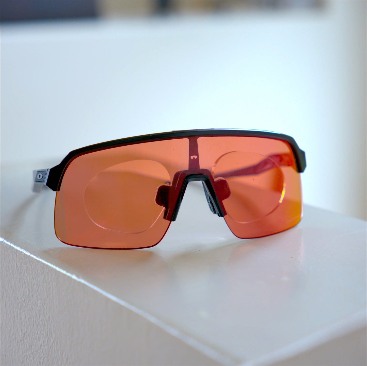 Oakley Sutro Lite with prescription insert installed, black frame, red Prizm Road lens