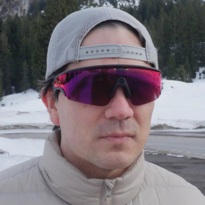 Person wearing Oakley Meta Vanguard with prescription insert outdoors in snowy mountain setting