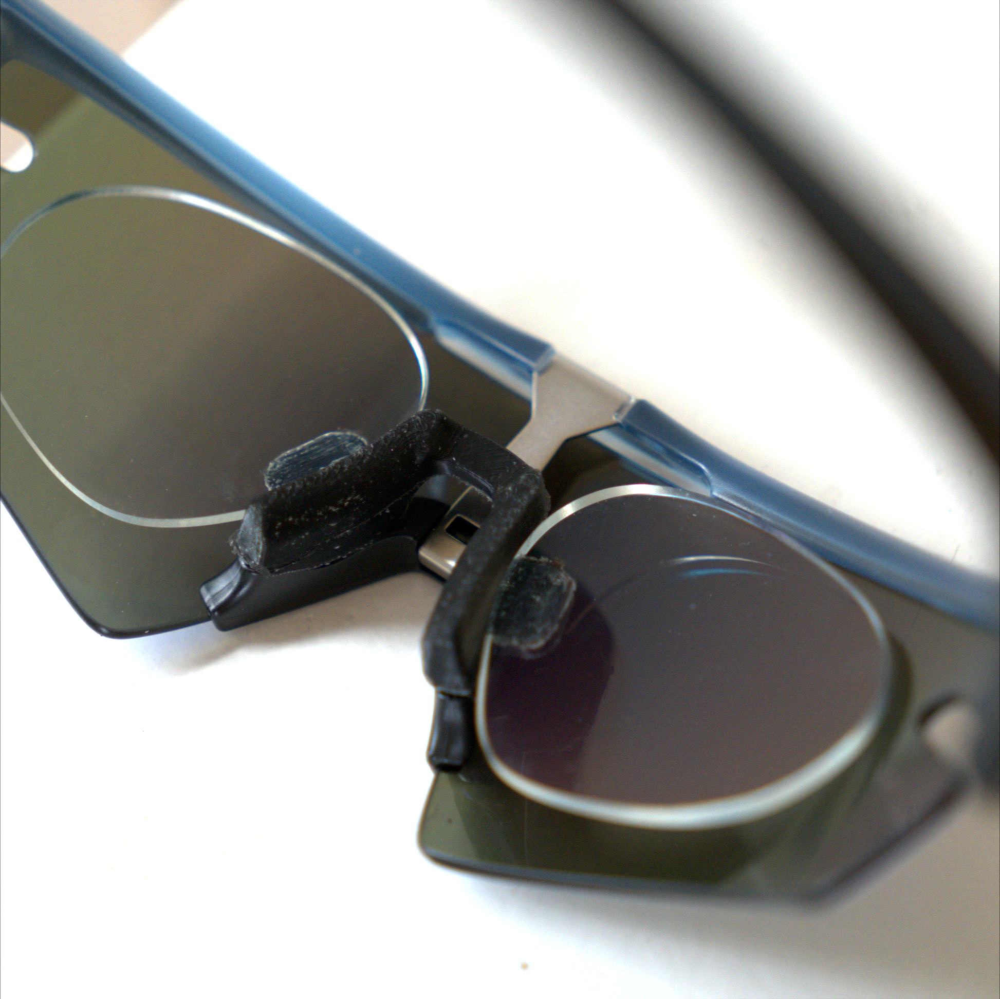 Close-up of the Oakley Sphaera prescription insert nosepiece and rimless prescription lens edges