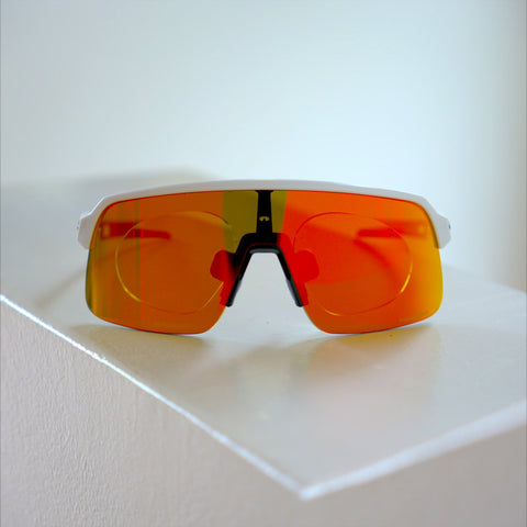 Oakley Sutro Lite S prescription insert front view, white frame with orange-red Prizm mirrored lens
