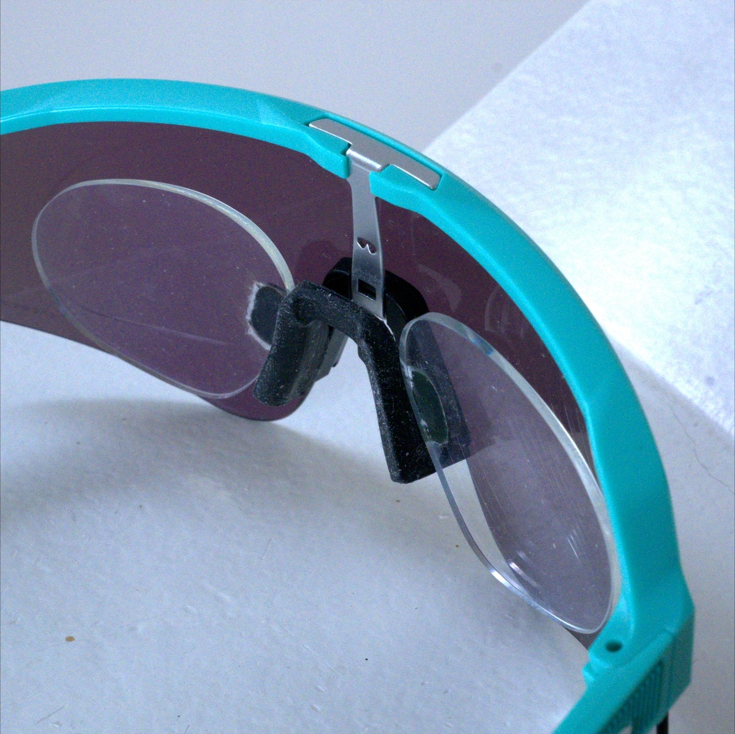 Rear view of Oakley Sutro Lite Sweep showing prescription clip insert attached to nosepiece