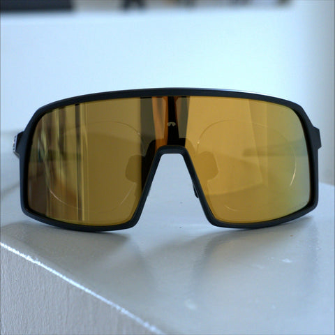 Oakley Sutro prescription insert front view, black frame with gold Prizm mirrored lens