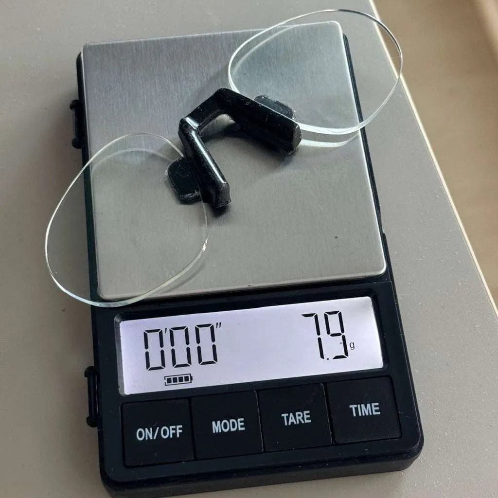 Prescription insert on digital scale showing 7.9 grams total weight