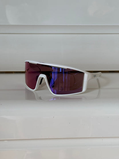 Cycling sunglasses with prescription insert installed, inside view showing pink lens